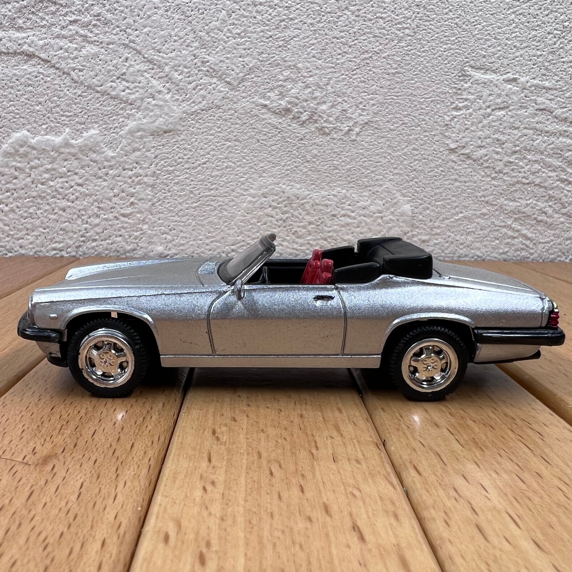 Lot 93 - A set of 12 Danbury Mint pewter Jaguar model Lot 93 - A set of 12 Danbury Mint pewter Jaguar model